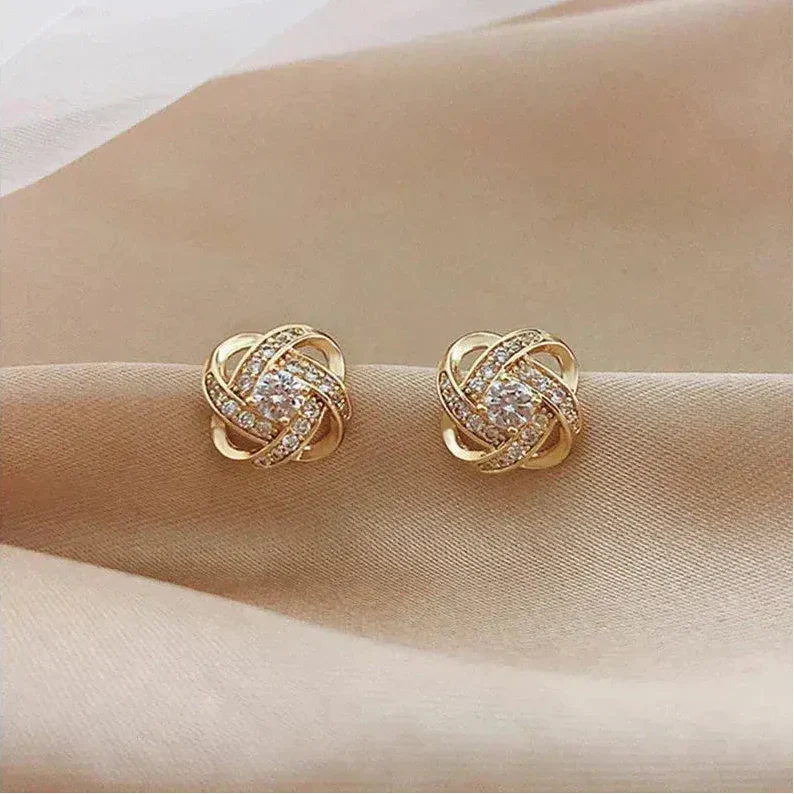 Lourdes - Pendientes Dorados de Espiral con Cristales