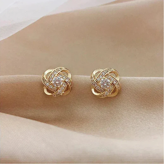 Lourdes - Pendientes Dorados de Espiral con Cristales