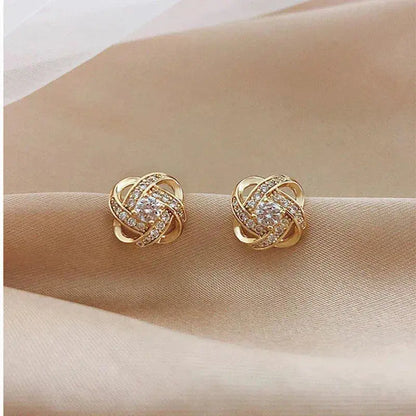Lourdes - Pendientes Dorados de Espiral con Cristales